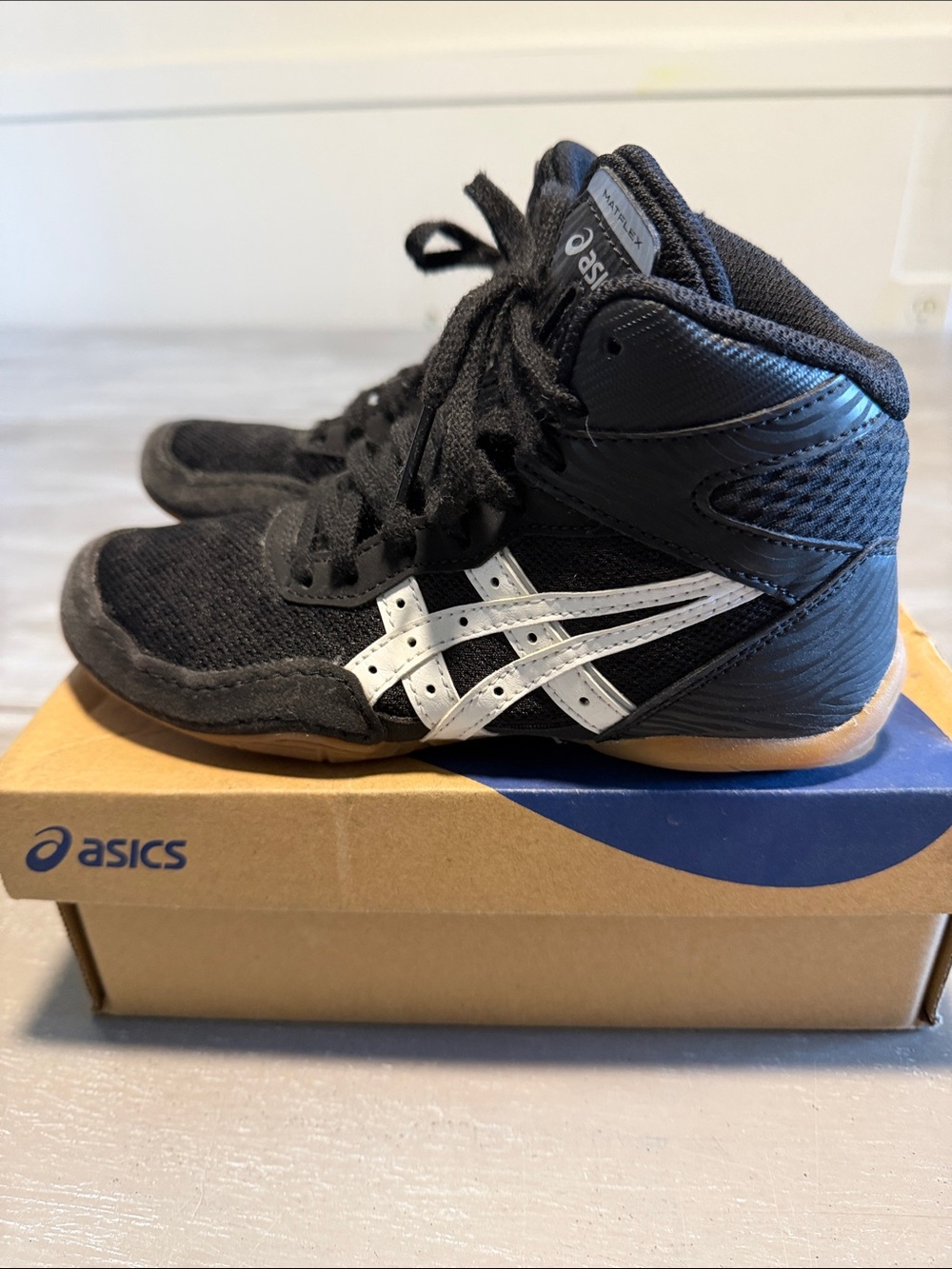 Asics Kids Black and White High-Top Sneakers